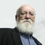 "Photo of Dan Dennett Describing Bernard Baars Scientific Work and Writing Global Workspace Theory"